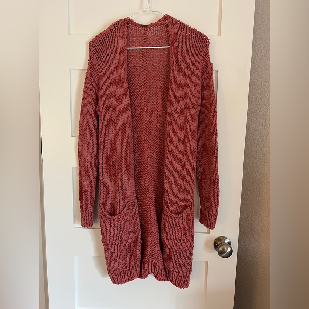 Pink, knit knee length sweater